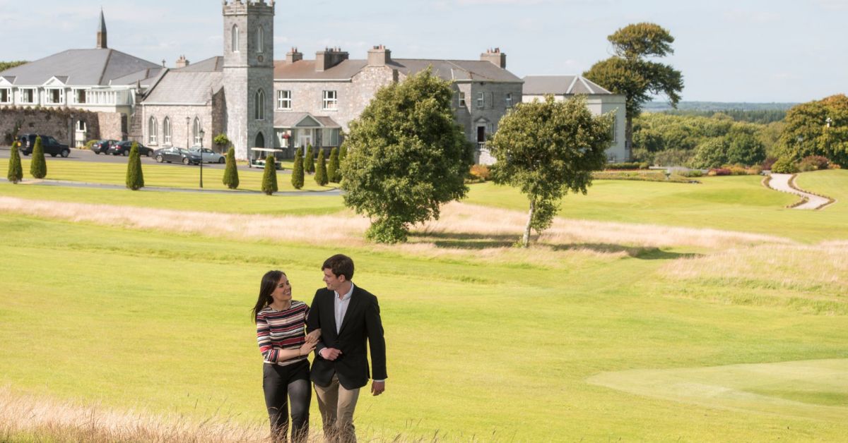 Couple Walking The Estate
