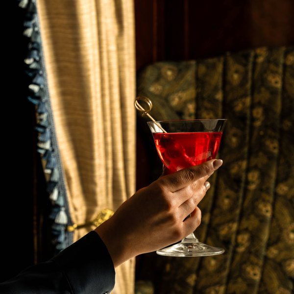 Cocktail with hand   small www.glenloabbeyhotel.ie